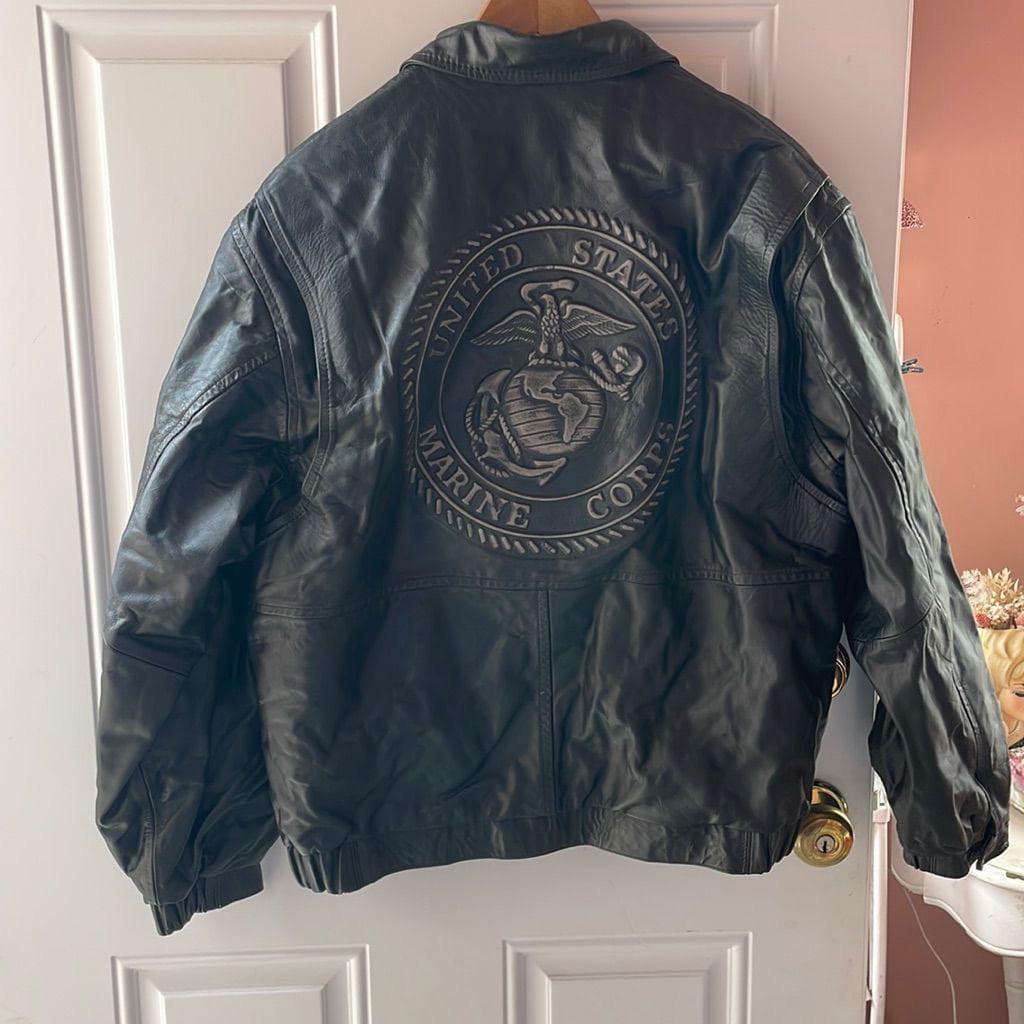 Vintage black leather bomber with embossed U.S. Marine Corps seal